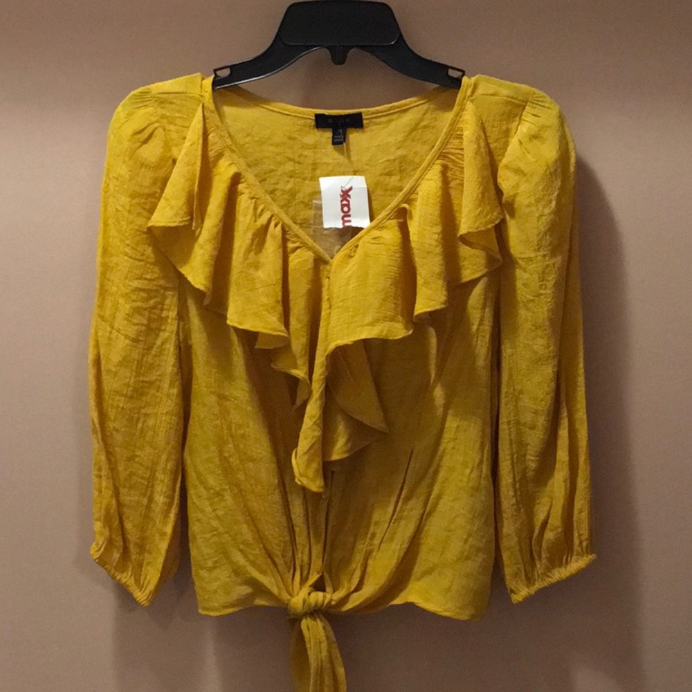 Women’s gold blouse with ruffles and tie, size M, NWT. Perfect for fall.